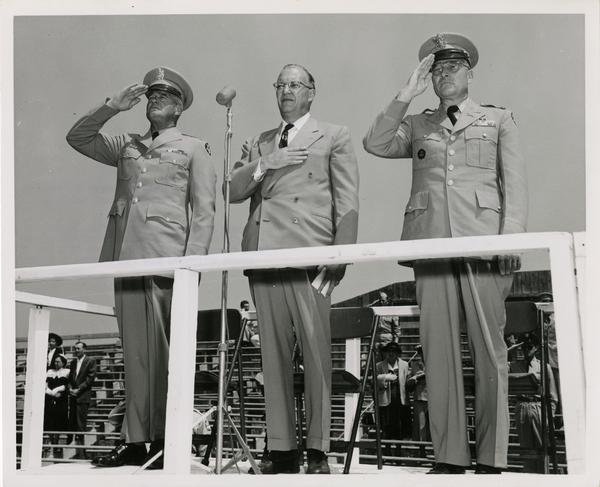 General William F. Dean, Chancellor Raymond B. Allen, and Colonel Maxwell Thompson address cadet regiment, June 2, 1955