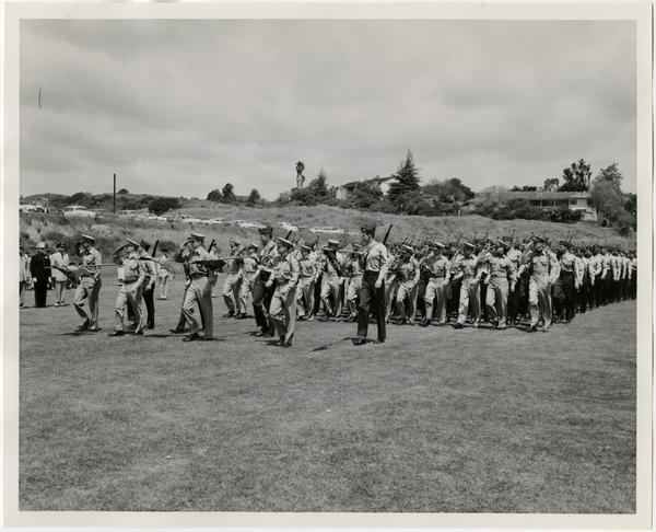 Marine Unit of the UCLA ROTC, passing in review during the Annual Joint ROTC Review, at the University of California Los Angeles, May 2, 1957.