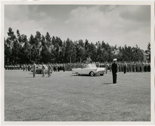 Chancellor Raymond B. Allen, Dean David F. Jackey with Colonel R. Lynch during the Annual ROTC Review, may 2, 1957