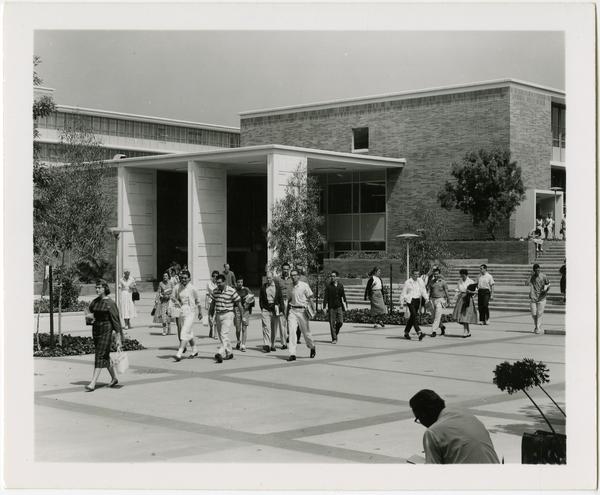 Students walk by Rolfe Hall