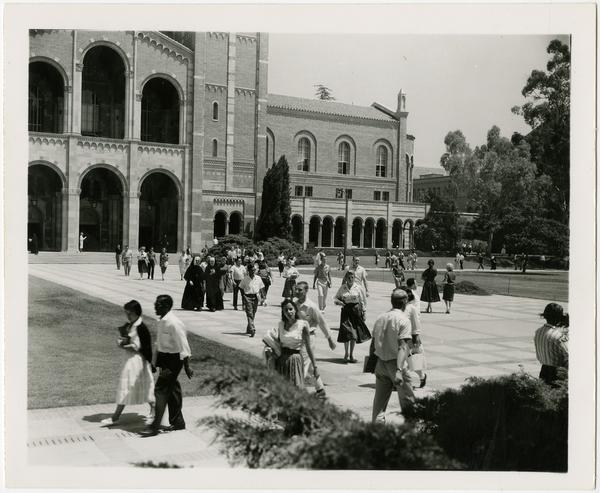 People walking in Royce Hall quad, ca. July 1958