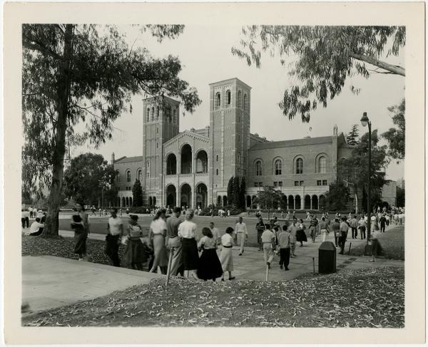 Students walking near Royce Hall, ca. 1955