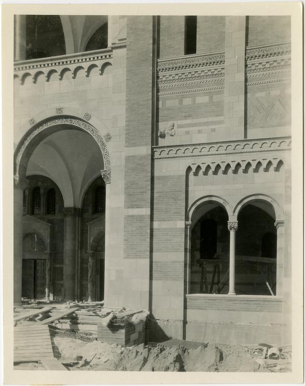 View of Royce Hall arcade and windows during construction