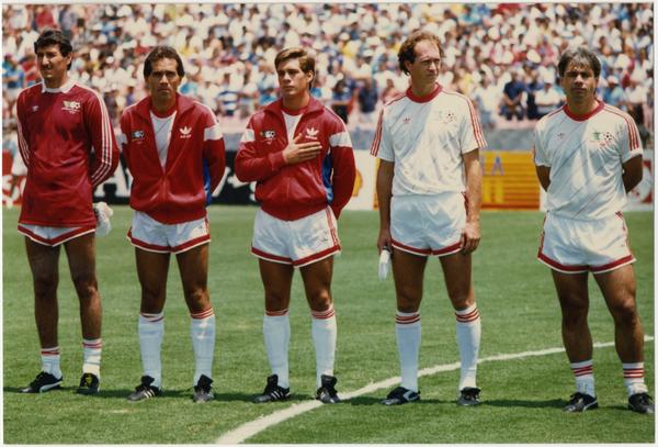 UCLA team member, Paul Caligiuri, holding hand over chest at 1986 FIFA World Cup All-Star Game , July 1986