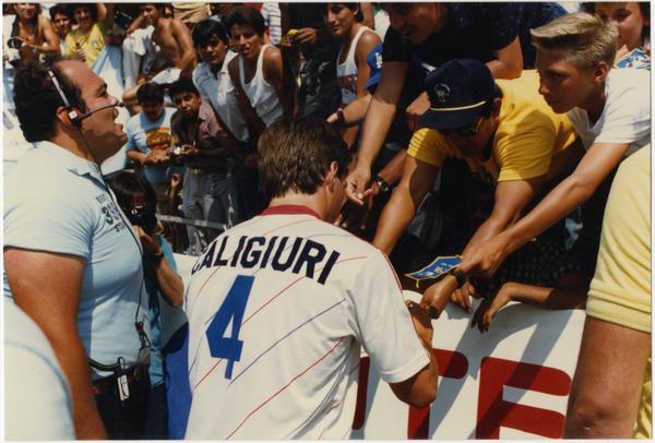 UCLA team member, Paul Caligiuri, signing autographs at 1986 FIFA World Cup All-Star Game , July 1986