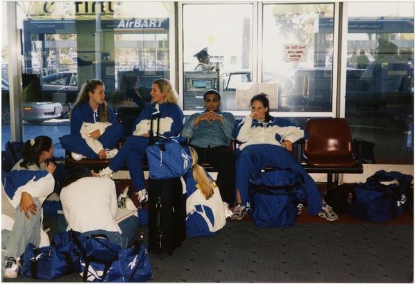 Spirit Squad waiting at airport, ca. November 1998
