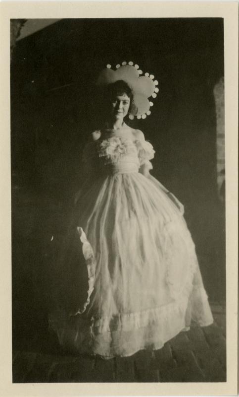 Actress dressed in costume for theatrical performance