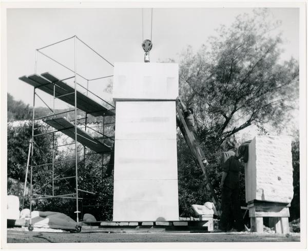 Installation of limestone column for Anna Mahler's scultpture