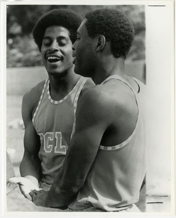 Two members of Record Breaking mile relay team, John Smith and Wayne Collett, ca. 1971