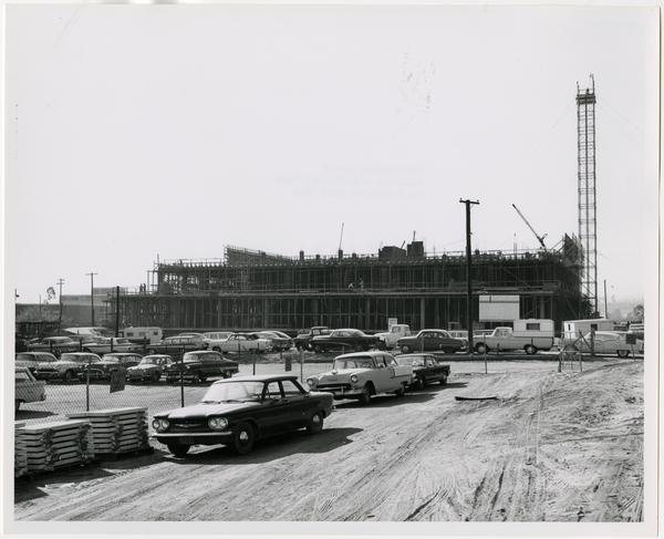 Side view of the construction of the University Research Library from the direction of Mcgowan Hall