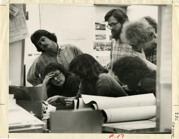 Students looking at materials, ca. 1970s