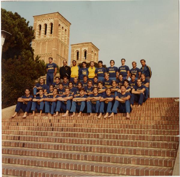 Portrait of Men's Swim Team on Janss Steps with Royce Hall in background