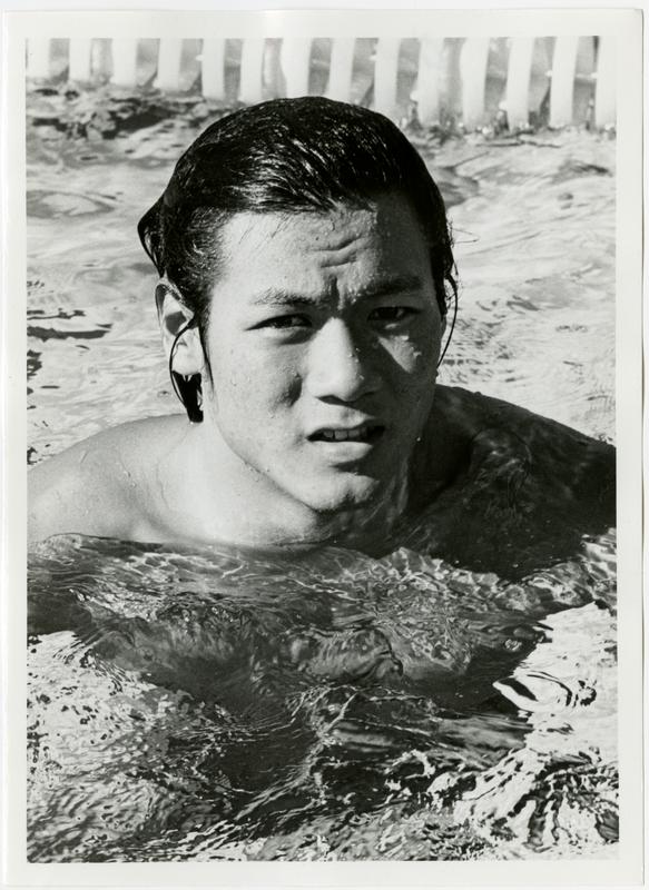 UCLA swim team member, Chris Woo in pool, ca. 1979