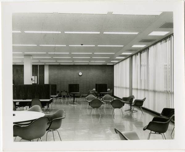 Empty chairs and tables in a study lounge of the University Research Library