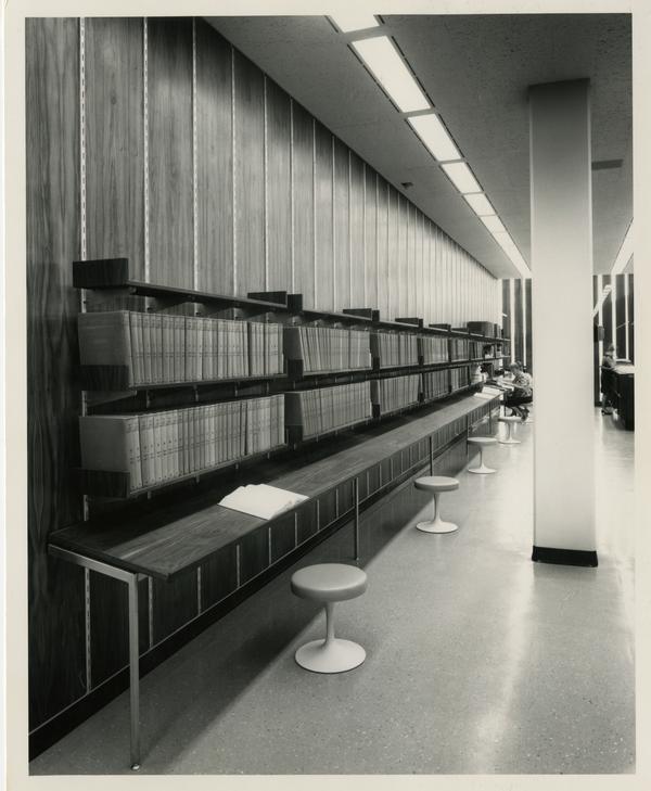 Long desk with a shelves of books above it for students to work at, University Research Library, ca. 1964
