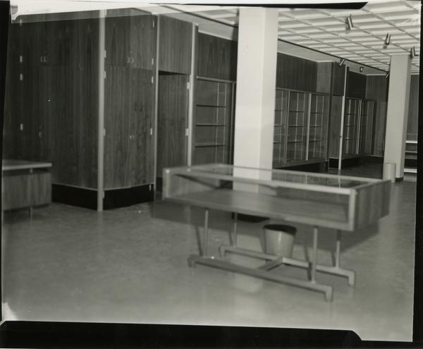 Contact print of empty display cases in University Research Library