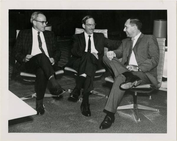 Mr. Miles and Mr. Vosper with unidentified man at University Research Library Open House, 1964