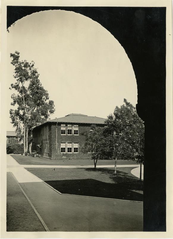 Looking towards building through arches on Vermont Ave campus
