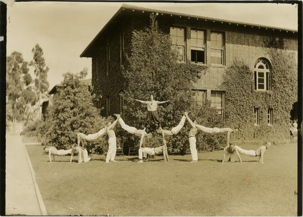 Vermont Ave campus gymnastics team posing in formation