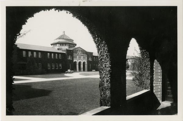 Millspaugh Hall through the arches on Vermont Ave campus