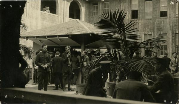 Students mingling on Vermont Ave campus, ca. 1925