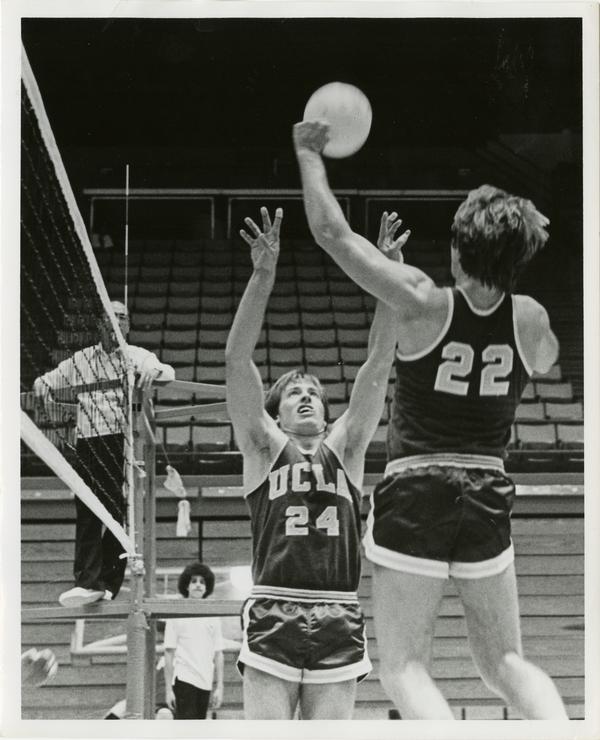 Two-time UCLA letterman Dave Olbright(24) sets up by Singin Smith, another two-time letterman in a 1978 early-season volleyball match.