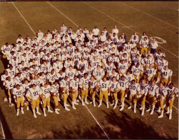 Group portrait of UCLA Football team and coaching staff