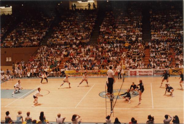 Looking at UCLA v Pepperdine volleyball game in progress from the stands, 1983