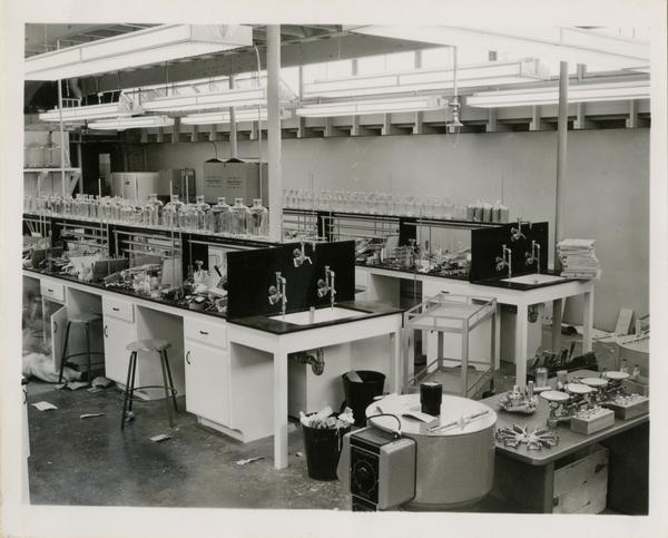 Shot of a messy medical school laboratory, 1955