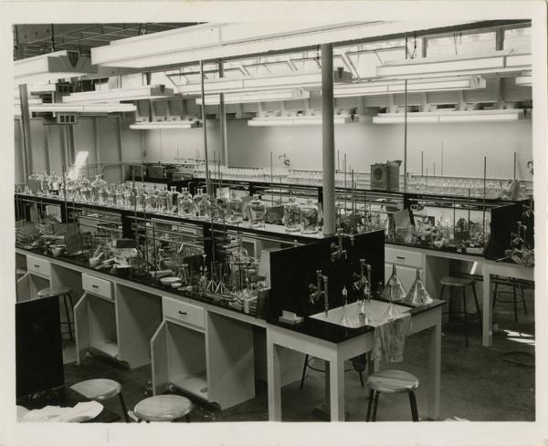 Empty medical school laboratory with equipment sitting on the work stations, 1955