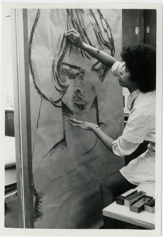 Art student, Marian Brown working with charcoal