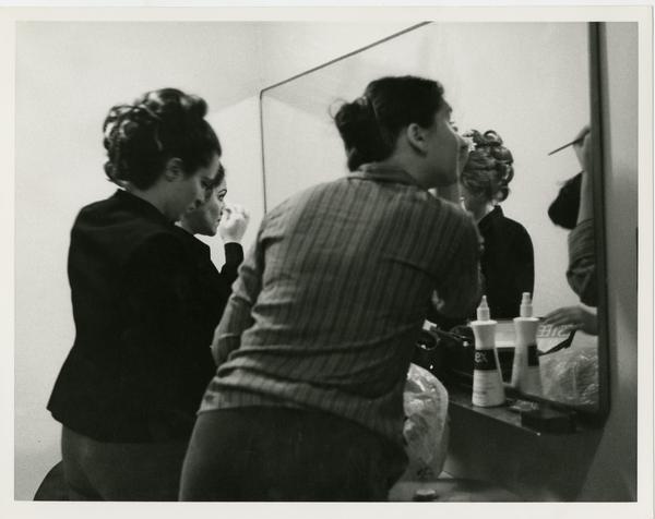 Actresses putting on make up in preparation for perfrming in Cosi Fan Tuttio Opera, 1978