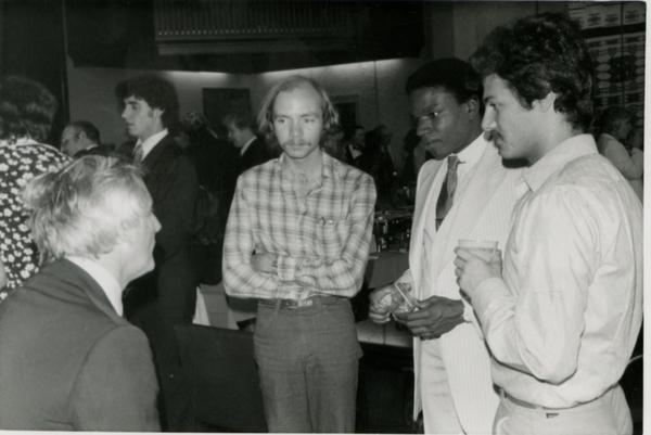 Group of four men speaking at Goldwyn Reception, May 1981