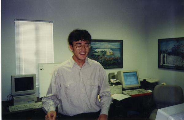 Member of Dean's OFC Staff standing in office