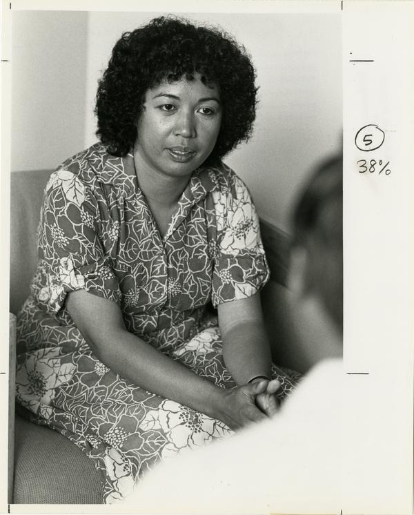Elvira Quintos speaks to a client at the Asian Pacific Counseling Center (5/10/1984)