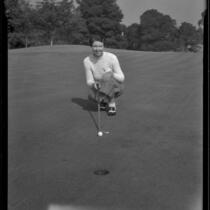 Lucille Robinson lining up a put at the Los Angeles Country Club, Los Angeles, 1934
