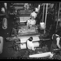 Inmates operating mechanical looms at San Quentin Prison's industrial program, Calif., circa 1948