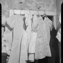 Dresses belonging to murder victims Madeline Everett, Melba Everett, and Jeanette Stephens, Inglewood, 1937