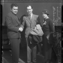 Actor Jean Hersholt, Prince Sigvard Bernadotte and Erika Bernadotte in front of train, 1935