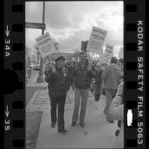 Actors Ed Asner and Dennis Weaver picketing during strike against advertising agencies in Los Angeles, Calif., 1978