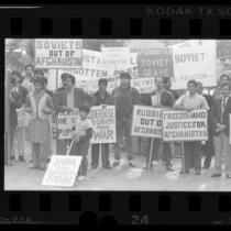 Afghani protesters with signs decrying Soviet occupation of Afghanistan, Los Angeles, Calif., 1986