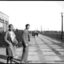 Registration - Mary Ellen Hohiesel and another student on the Esplanade, 1930
