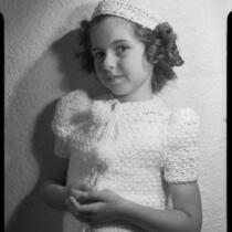 Sylvia Arslan in crocheted sweater and cap, [1939-1940?]