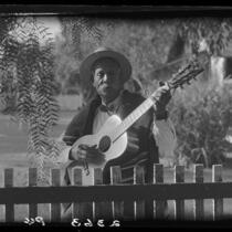 Eugene R. Plummer with guitar, Hollywood, 1927