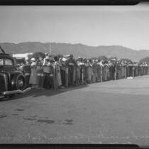 Mourners attending the arrival of the bodies of Will Rogers and Wiley Post at Union Air Terminal, Burbank, 1935