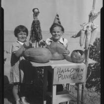 Children at table with Halloween decorations, Los Angeles, circa 1935