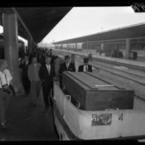 Actor Errol Flynn's coffin on Los Angeles Union Station train platform, Calif., 1959