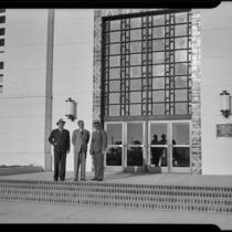Santa Monica City Hall dedication, Mayor Edmond S. Gillette and two others at entrance, Santa Monica, 1939