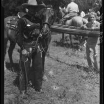 Actor Reginald Denny and horse, Lake Arrowhead Rodeo, Lake Arrowhead, 1929