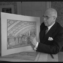 Pioneer Designer John B. Holtzclaw explaining new drawings, Los Angeles, 1935